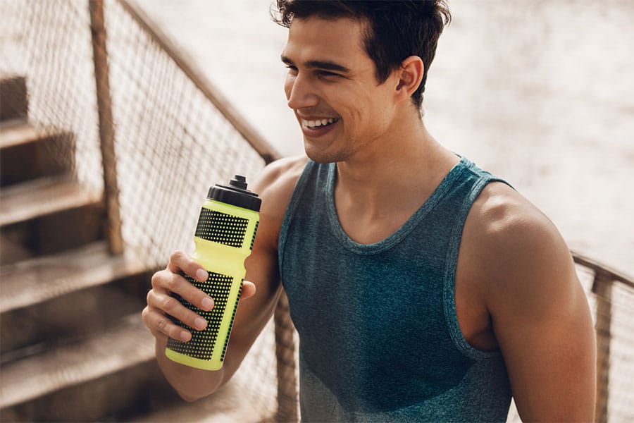 Man Working Out Drinking Water