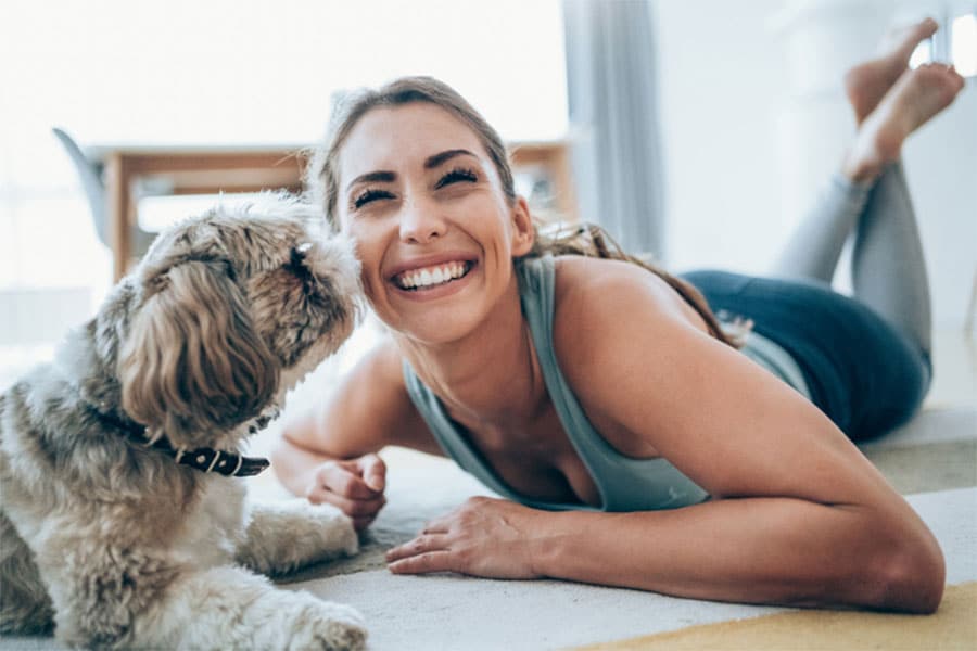 Woman smiling with Dog